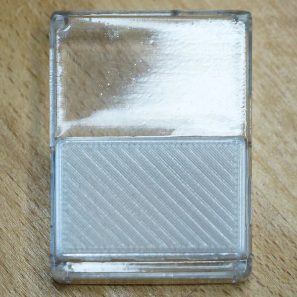 Transparent HackHeld Vega II case from the inside - textured bottom part