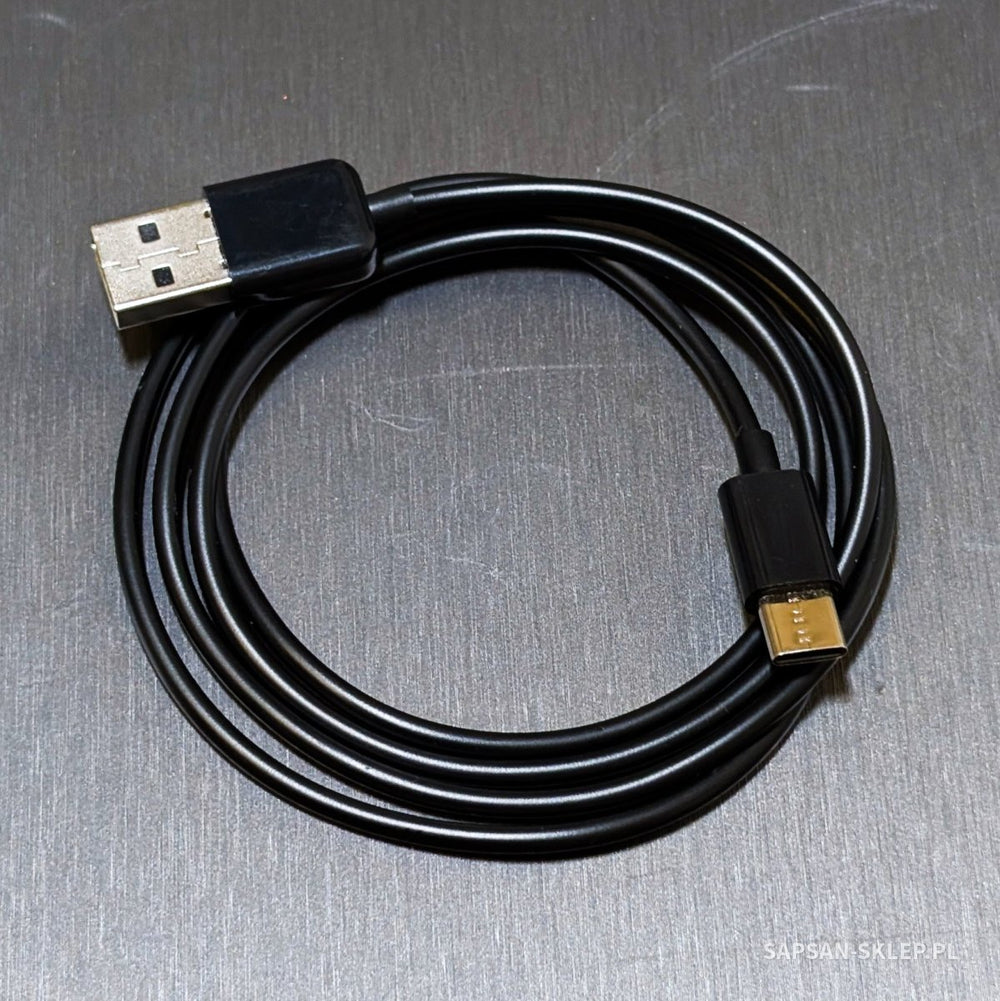 Evil Crow Cable Pro BadUSB - a coiled black cable with USB-A and USB-C plugs