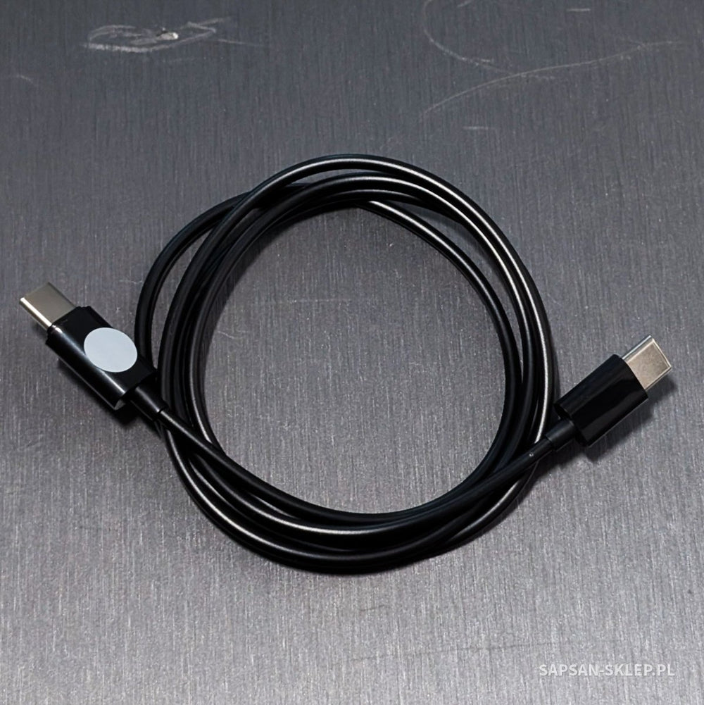 Evil Crow Cable Wind BadUSB WiFi - a coiled black cable with two USB-C plugs, one bearing a round sticker