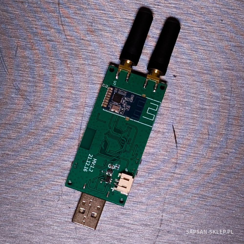 Evil Crow RF V2 board from the underside with the WiFi module and two black antennas attached