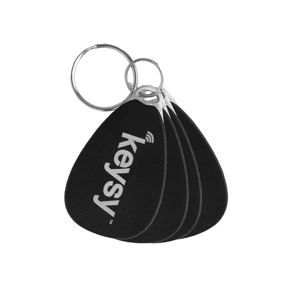 Fünf schwarze Keysy LF RFID-Schlüsselanhänger mit dem keysy-Logo an Ringen, zum Schreiben kopierter Zugangskarten