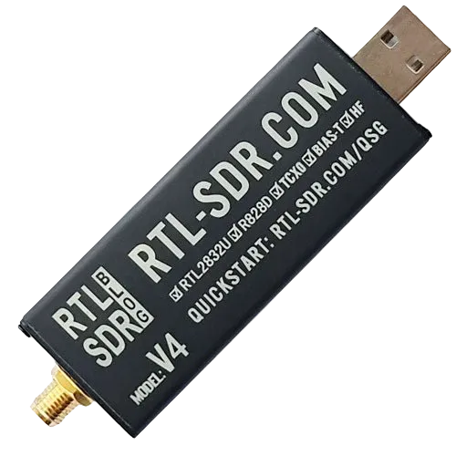 Black RTL-SDR Blog V4 USB receiver standing diagonally on a white background - the housing bears the texts RTL-SDR.COM, RTL SDR BLOG, MODEL: V4 and ticked boxes RTL2832U, R828D, TCXO, BIAS-T, HF plus QUICKSTART: RTL-SDR.COM/QSG, a gold SMA antenna connector and a USB-A plug