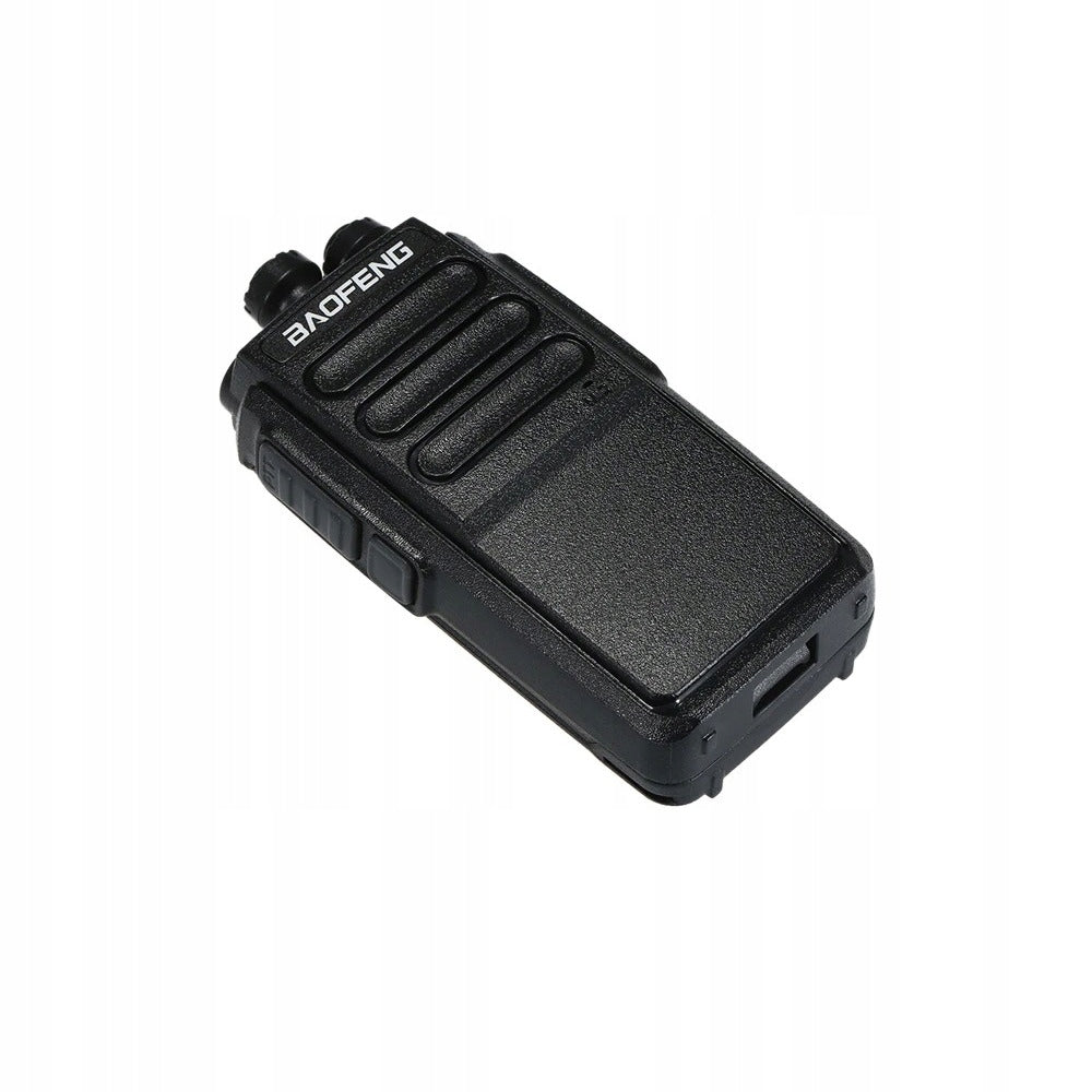 Baofeng C3 walkie-talkie lying down, with the PTT button on the side, the speaker grille and the Micro USB port at the bottom
