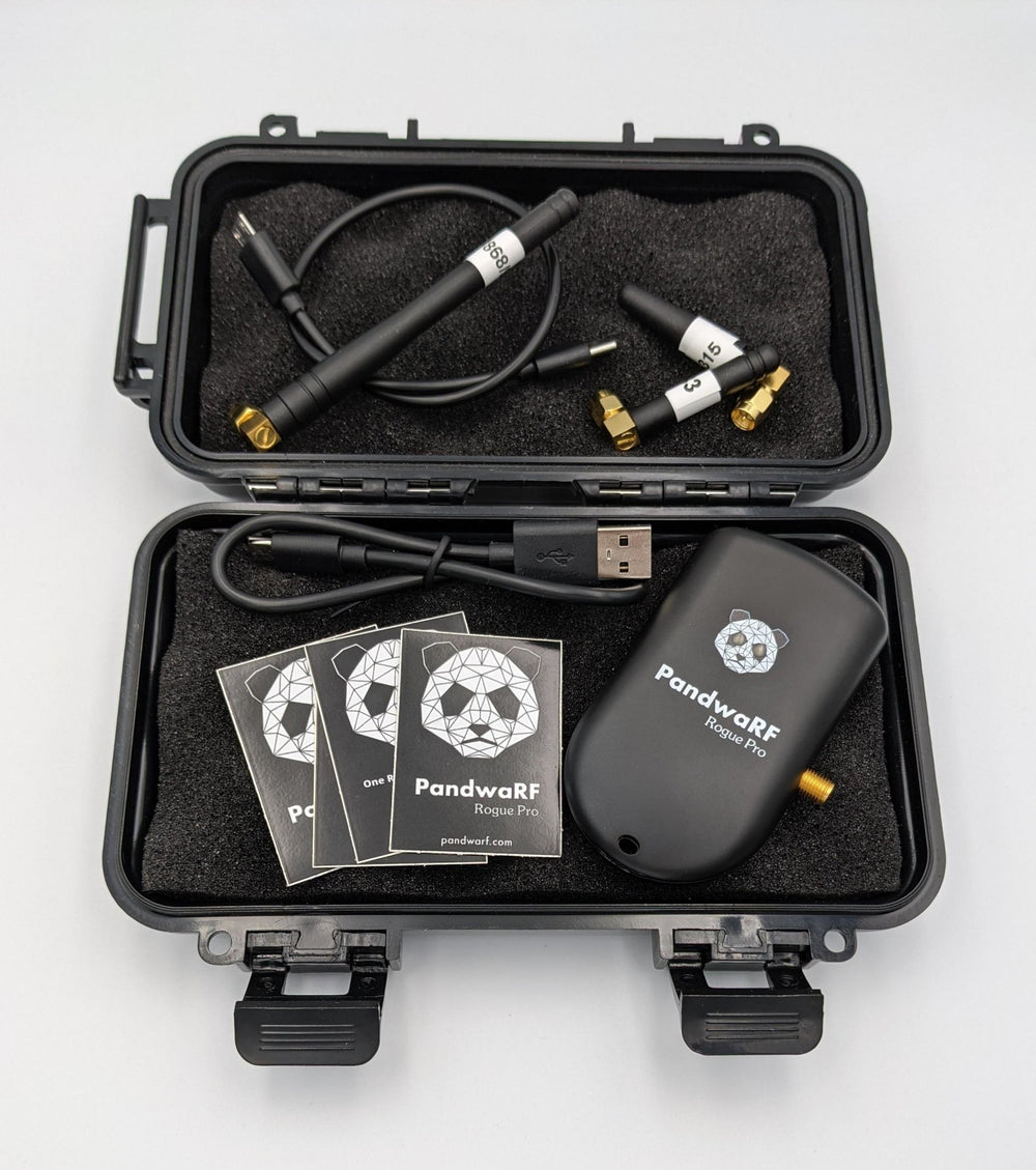 Black case with the PandwaRF Rogue Pro device, a set of antennas (315/433/868 MHz), USB cable and information cards