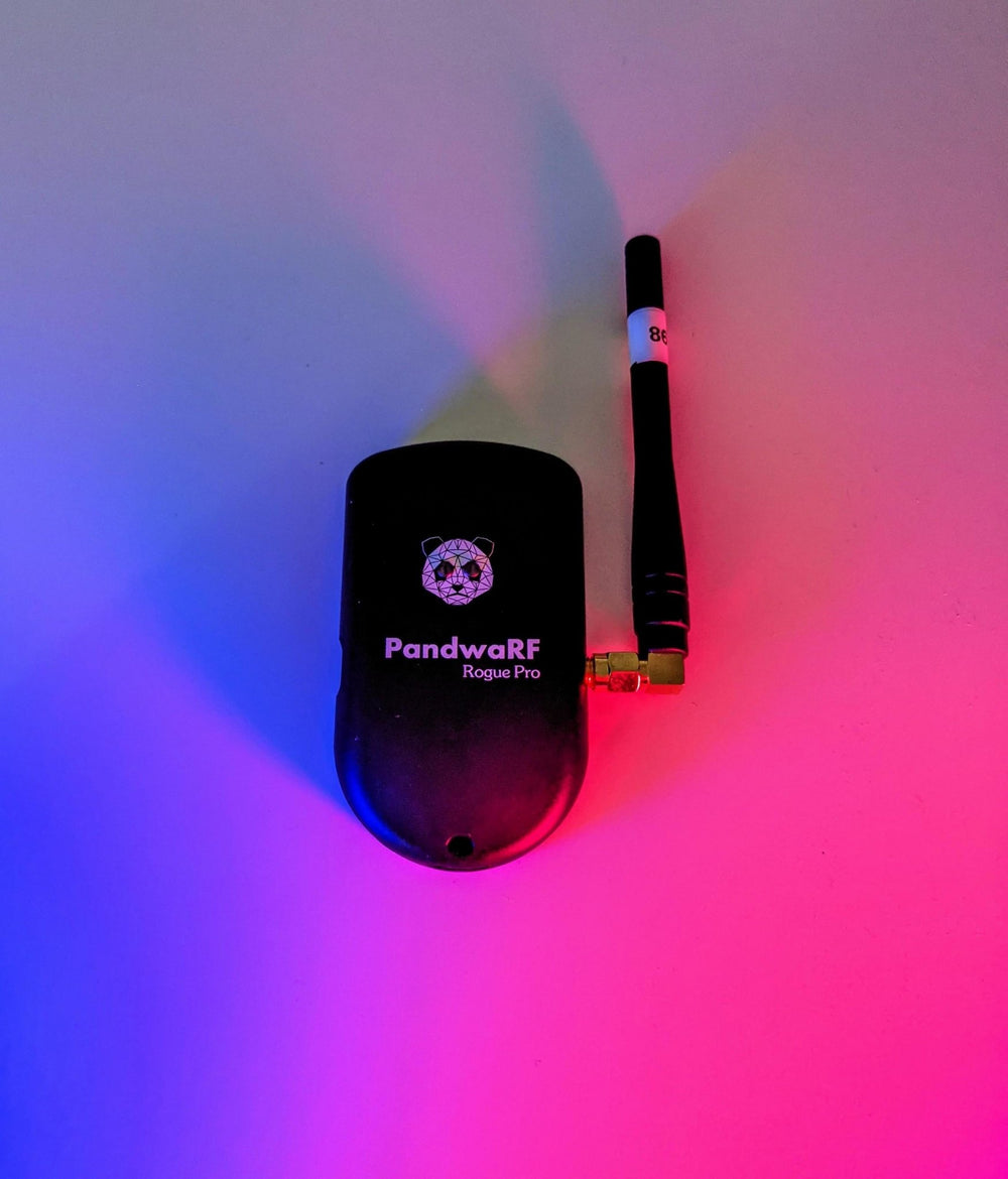Black PandwaRF Rogue Pro RF device with a panda logo and an attached antenna, in blue-pink lighting