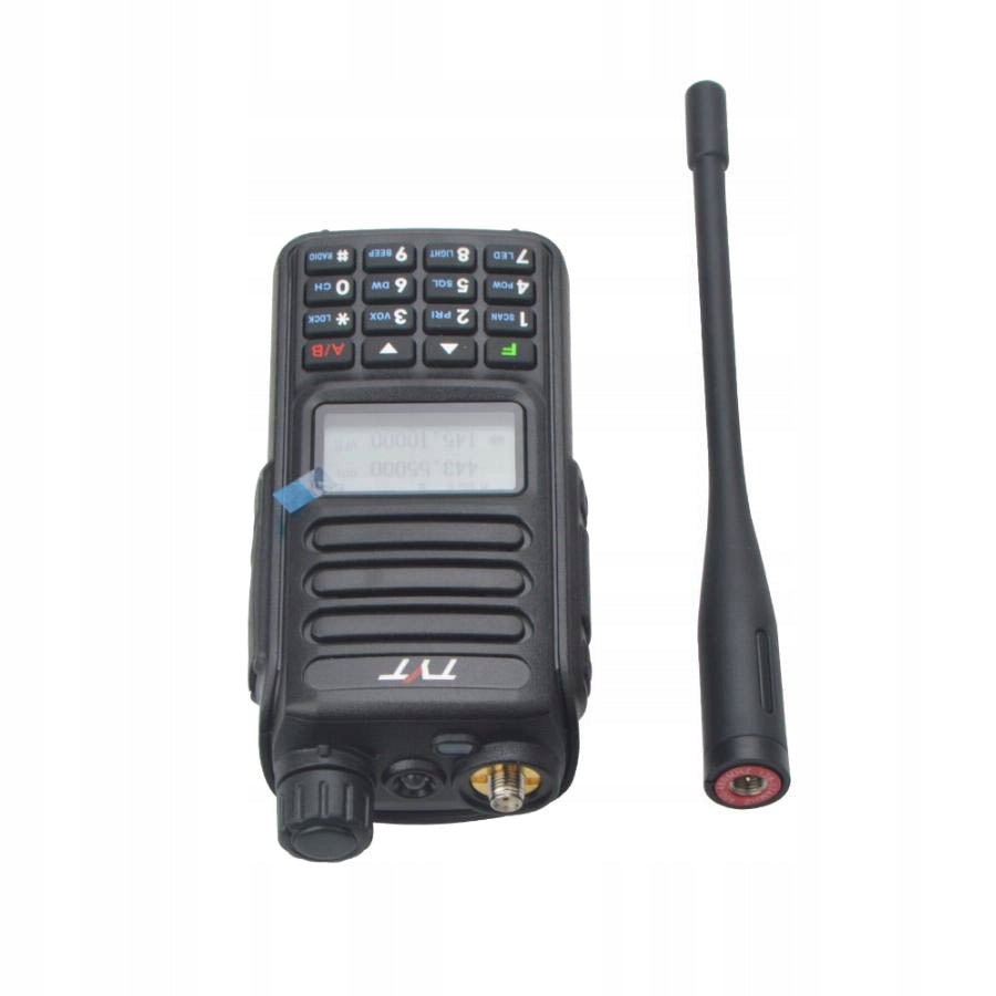 TYT TH-UV98 radio with the antenna unscrewed and lying alongside, showing the SMA antenna connector and the dual-band display, on a white background