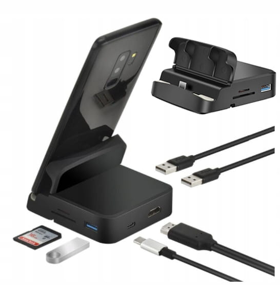 Stacja dokująca HUB - czarny dok ze stojakiem na telefon i portami SD, USB-A, USB-C i HDMI, obok karta SD, pendrive oraz kable USB i HDMI