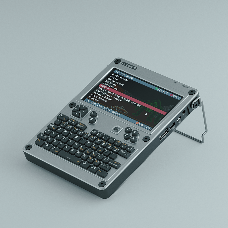 uConsole od ClockworkPi na podstawce, szara obudowa z klawiaturą QWERTY