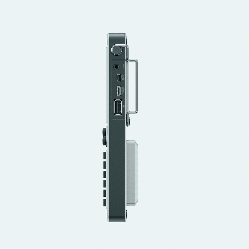 Bok srebrnego uConsole z widocznymi portami audio, micro HDMI, USB-C i USB-A
