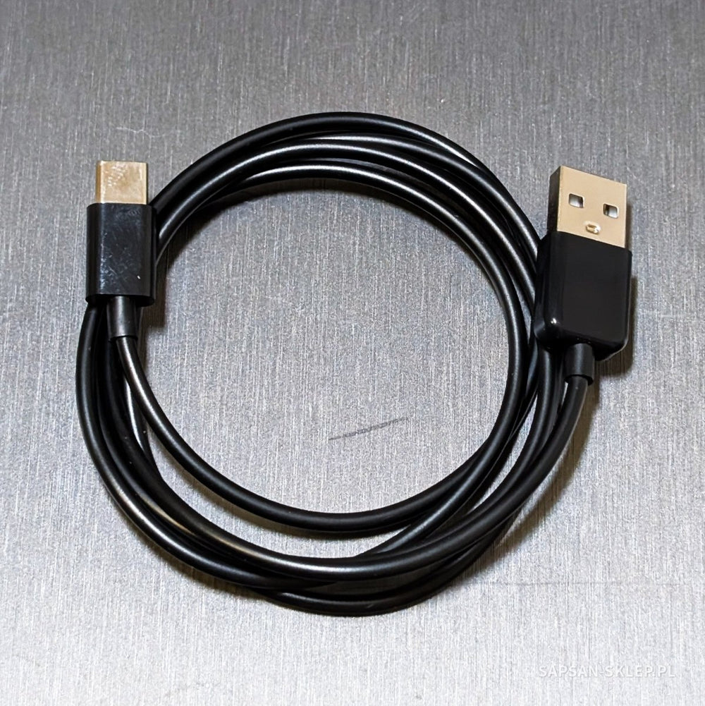 Evil Crow Cable Wind BadUSB WiFi - ein aufgerolltes schwarzes Kabel mit USB-A- und USB-C-Steckern