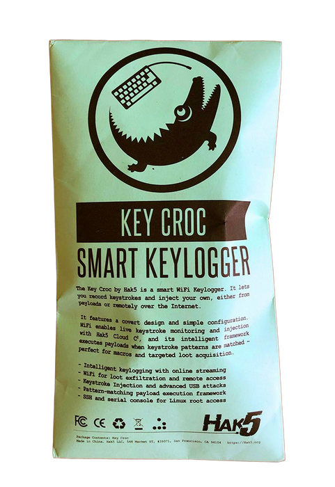 Обратная сторона упаковки KEY CROC Hak5 - мятная коробка с коричневой печатью: логотип с крокодилом и клавиатурой в круге, заголовок KEY CROC SMART KEYLOGGER, описание продукта, значки сертификации и логотип HAK5, на белом фоне