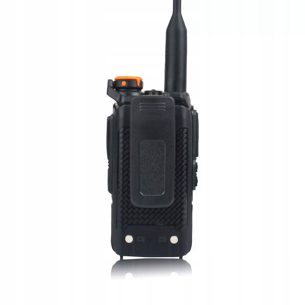 Quansheng UV-K5 from the back, belt clip, textured battery pack and charging contacts