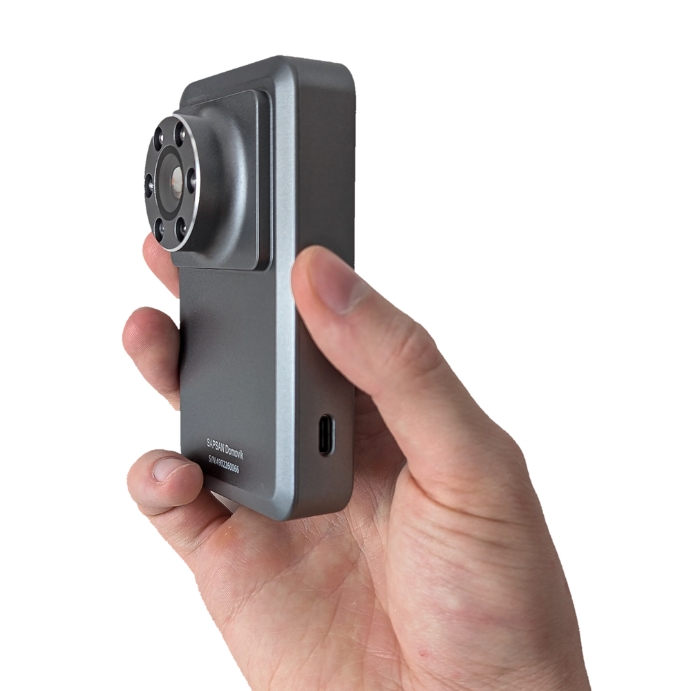 Side view of SAPSAN Domovik in hand, showing the USB-C port