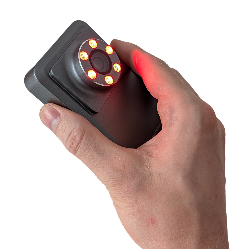 SAPSAN Domovik in hand with the LEDs around the lens glowing red