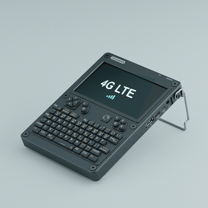 Černá uConsole s rozloženým stojánkem, na displeji nápis 4G LTE - verze s modulem LTE
