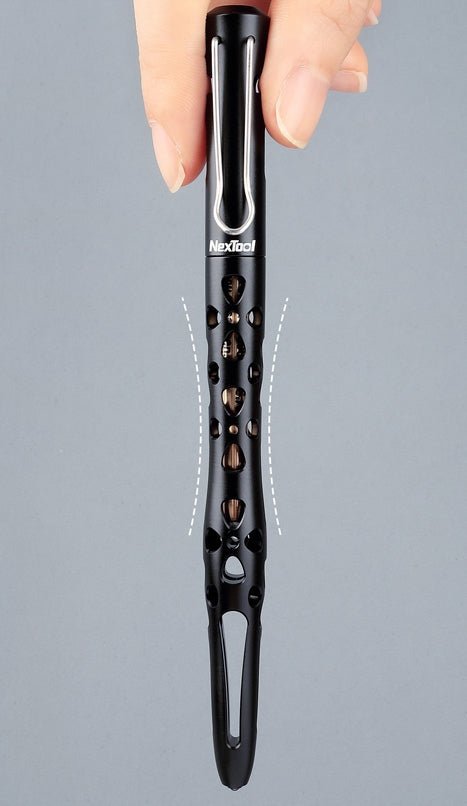 NexTool KT5513A tactical pen held vertically in fingers, with the NexTool logo and the tapering skeletonised grip