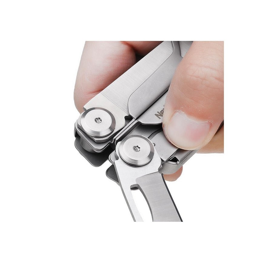 Close-up of fingers deploying the tools of the NexTool Flagship Pro multitool, with the pivots and mechanism visible