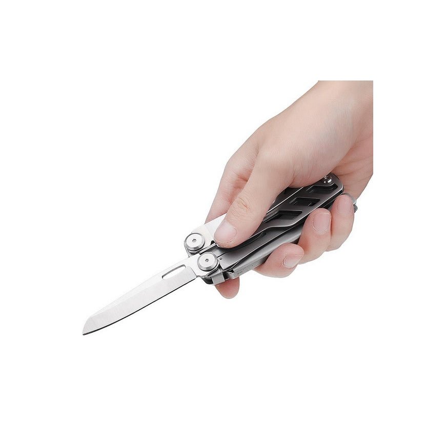 A hand holding the folded NexTool Flagship Pro multitool with the knife blade deployed