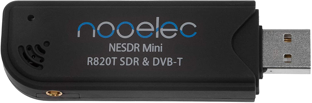 Black Nooelec NESDR Mini R820T SDR receiver with USB-A plug and MCX antenna connector, side view