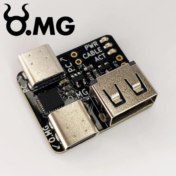 O.MG Programmer von Hak5 - schwarze Platine mit O.MG-Logo, zwei USB-C-Anschlüssen, einem USB-A-Port und beschrifteten Pads